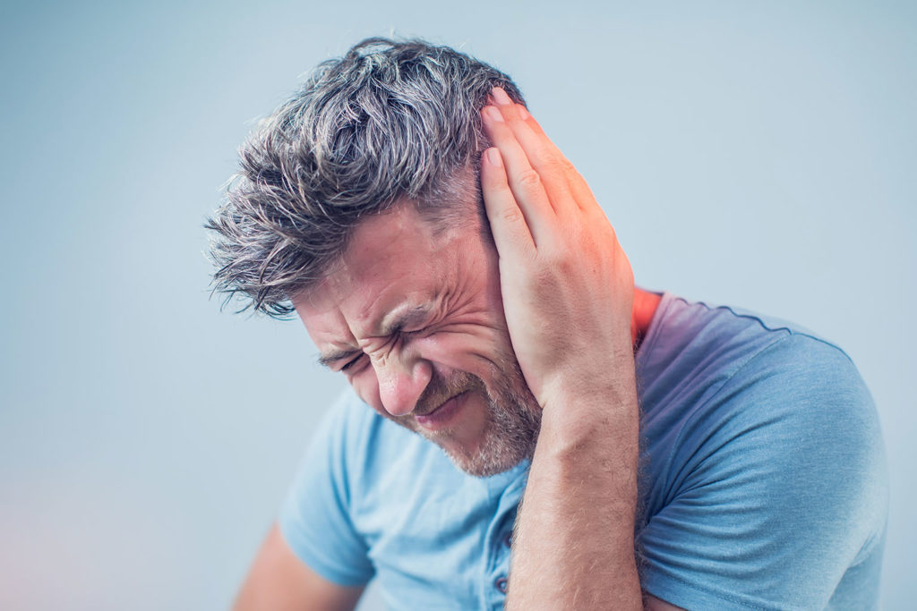 Male suffering from Tinnitus