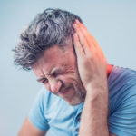 Male suffering from Tinnitus