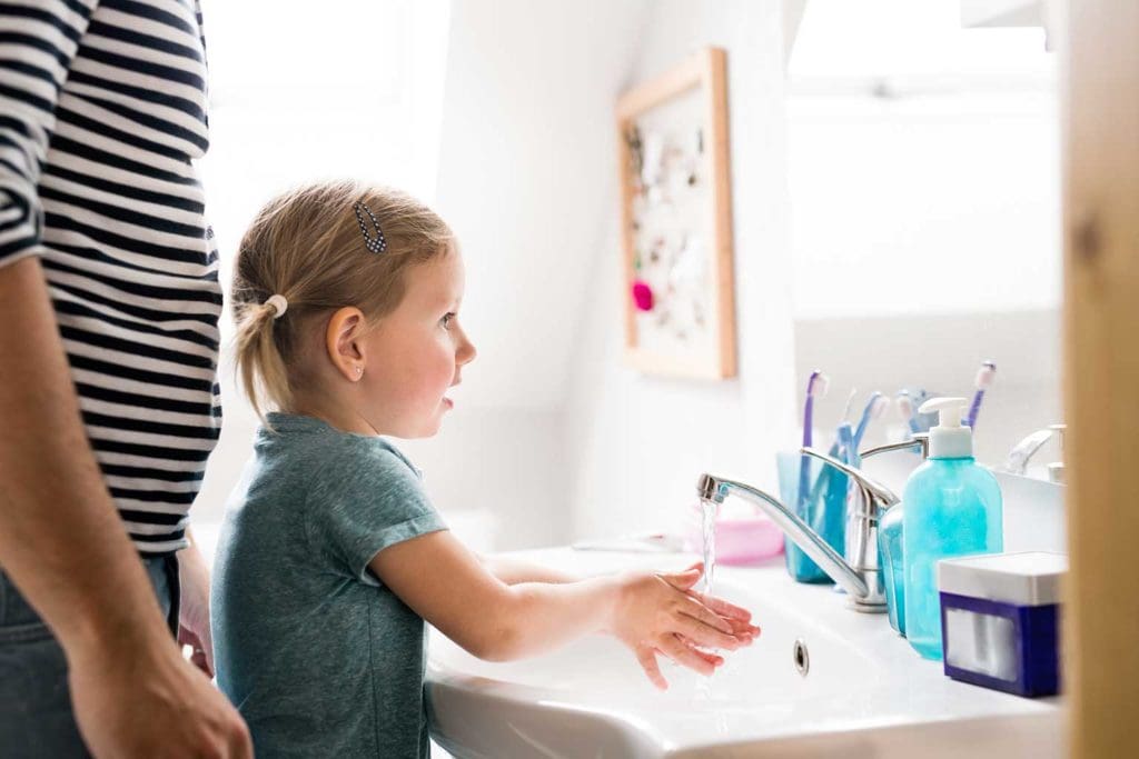 Child washing hands